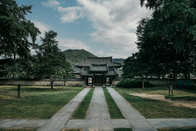 A traditional asian temple on a cloudy day.